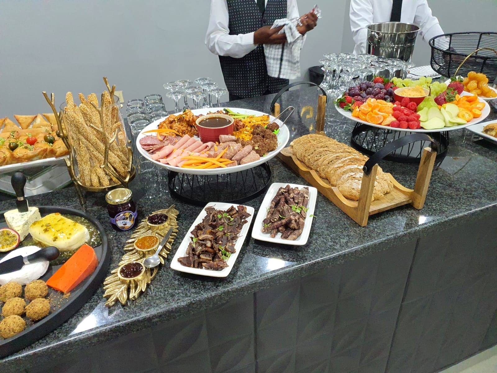 Spitbraai catering service with slow-roasted meats served at an event by Spitz and Bitz